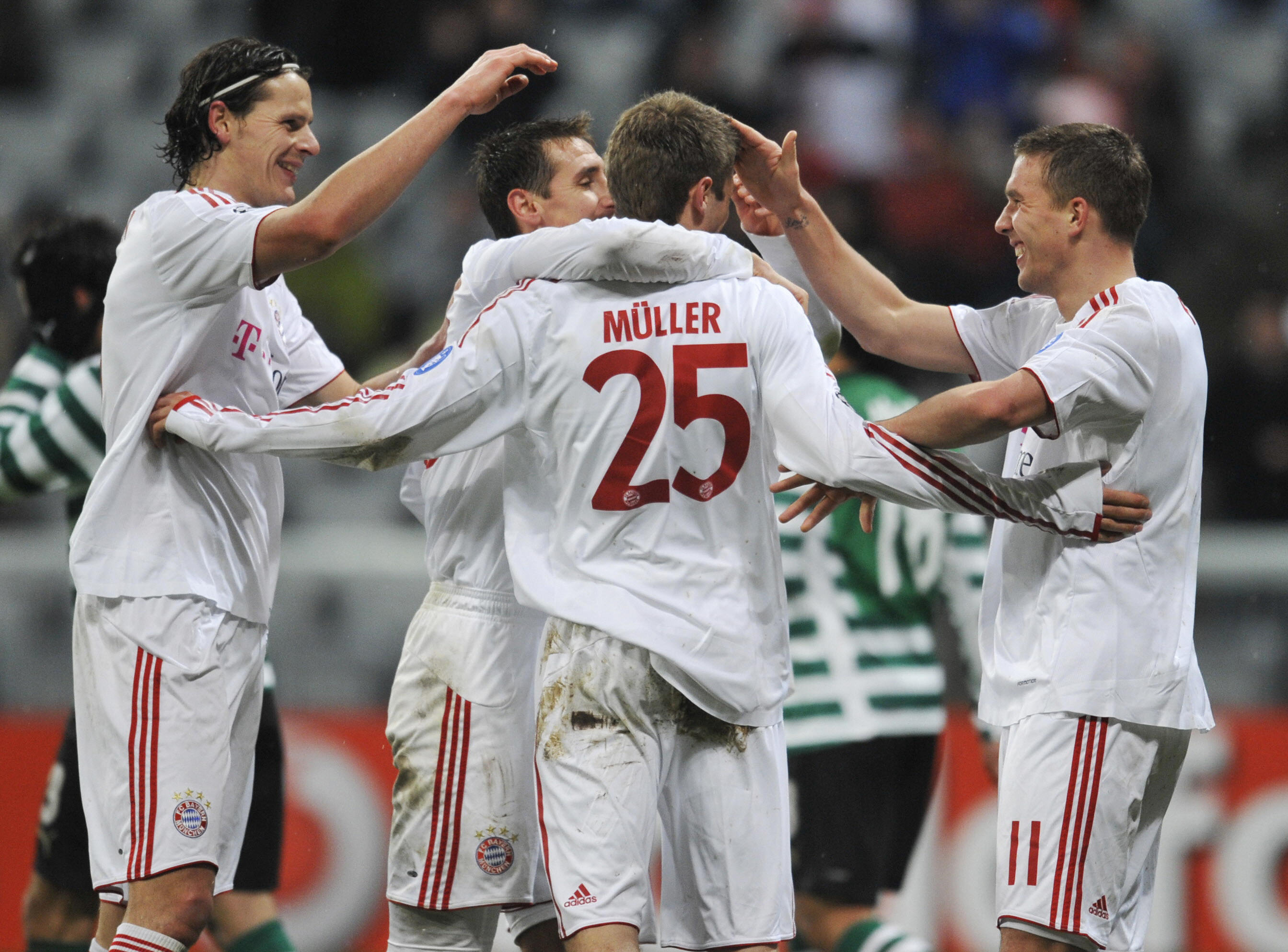 Bayern Munich players celebrate a goal in their 7-1 win over Sporting CP in the last 16 of the Champions League in March 2009.