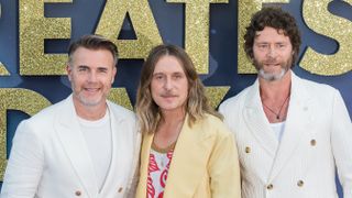 Howard Donald (R), Gary Barlow (L) and Mark Owen (C) from Take That attend the world premiere of 'Greatest Days',