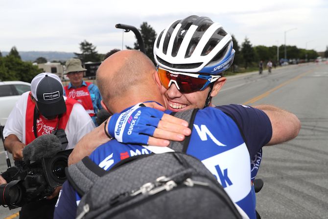 Deceuninck-QuickStep's Remi Cavagna receives the congratulations of his soigneur after winning stage 3 of the 2019 Tour of California