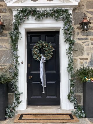 Front door with Christmas wreath