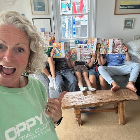 Becca Maberly with her family reading The Week Junior