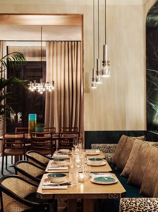 Restaurant seating area and draped lighting