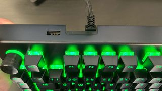 Razer BlackWidow V4 Pro keyboard from above, showing connection ports and USB passthrough options