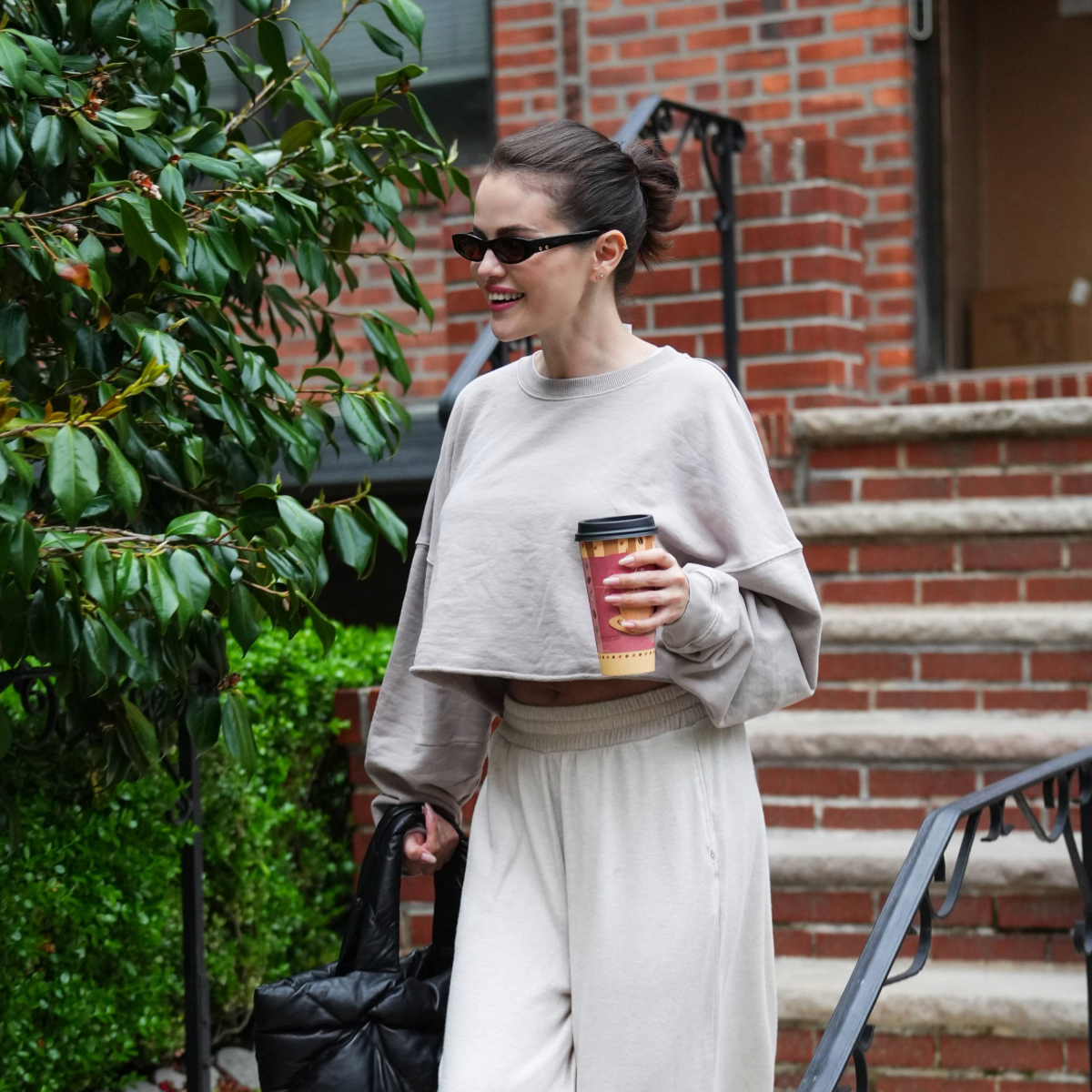 Selena Gomez wearing UGG slippers in New York