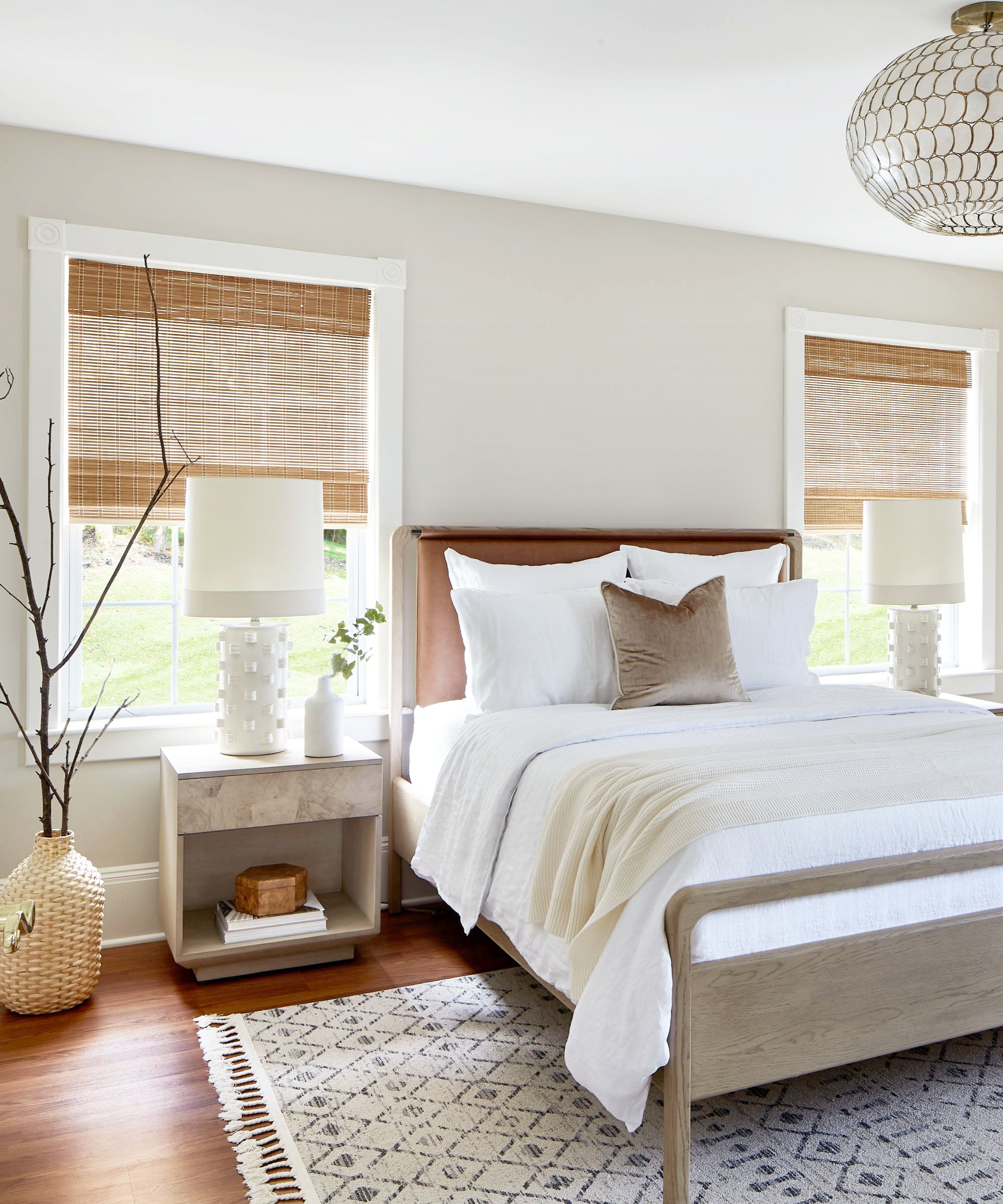 Neutral bedroom painted in Revere Pewter