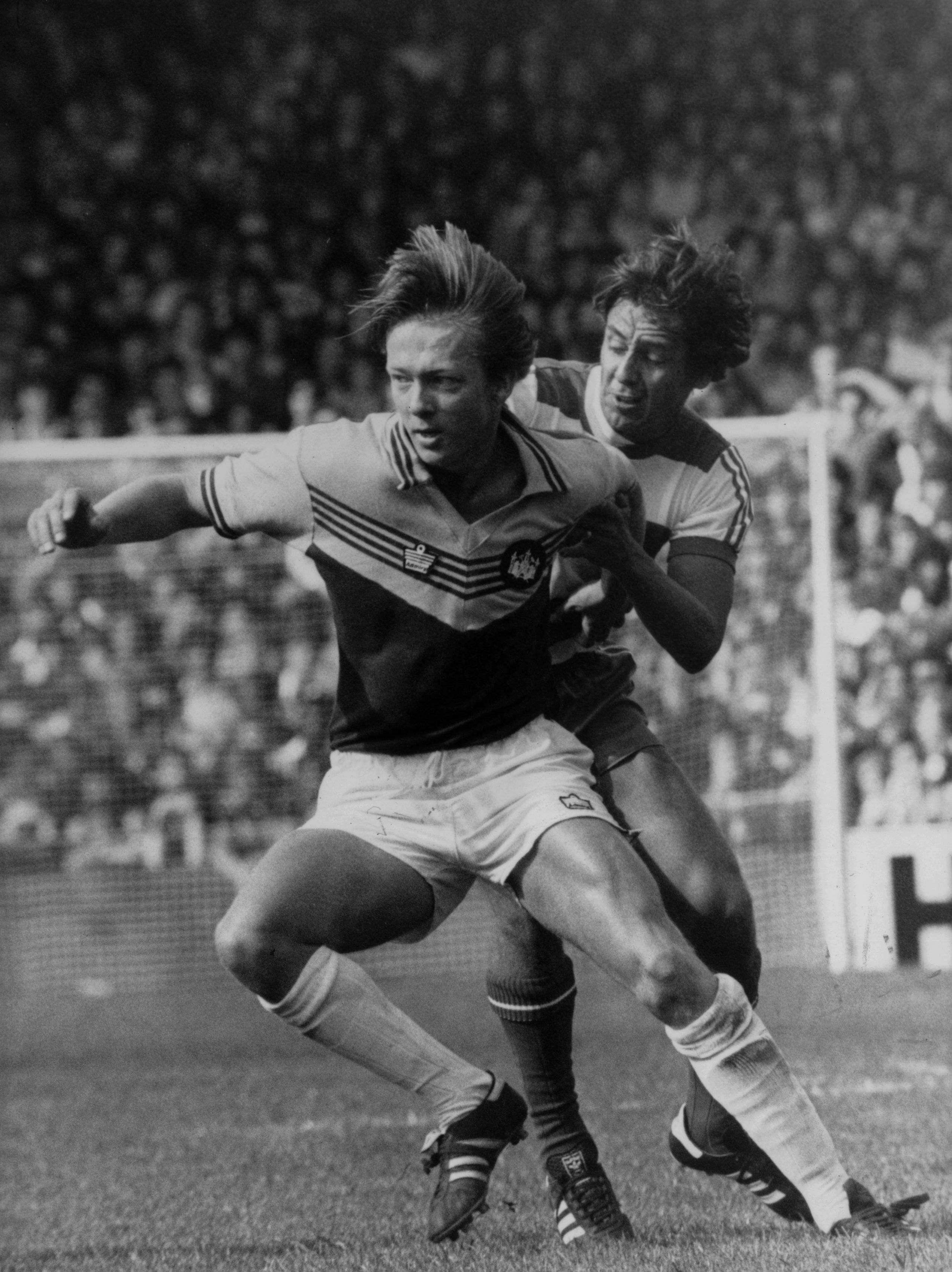 10th September 1977: Queen&amp;amp;apos;s Park Rangers footballer Don Masson (right) tackling Alan Curbishley of West Ham during a game at Upton Park, London. (Photo by Central Press/Getty Images)