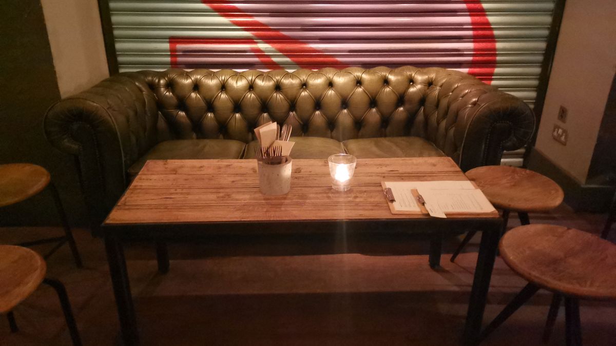A table in a dark bar. Image credit: TechRadar