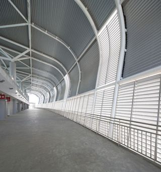 Grey interior of sports hub walkway