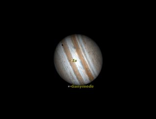 Two of Jupiter’s moons cross Jupiter’s disk in March 2012.