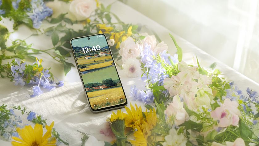 The TCL NXTPAPER 60 Ultra in a cluster of flowers.