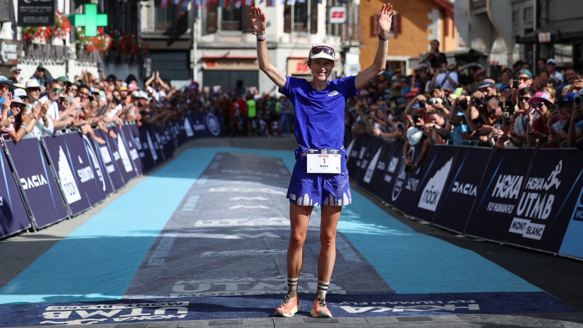 US&#039; athlete Katie Schide gestures as she celebrates victory while crossing the finish line at the end of the Ultra-Trail du Mont Blanc (UTMB) women&#039;s race in Chamonix