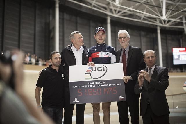 Matthias Br&auml;ndle with UCI president Brian Cookson after breaking the hour record