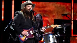Chris Stapleton performs onstage during the 2015 "CMT Artists of the Year" at Schermerhorn Symphony Center on December 2, 2015 in Nashville, Tennesse
