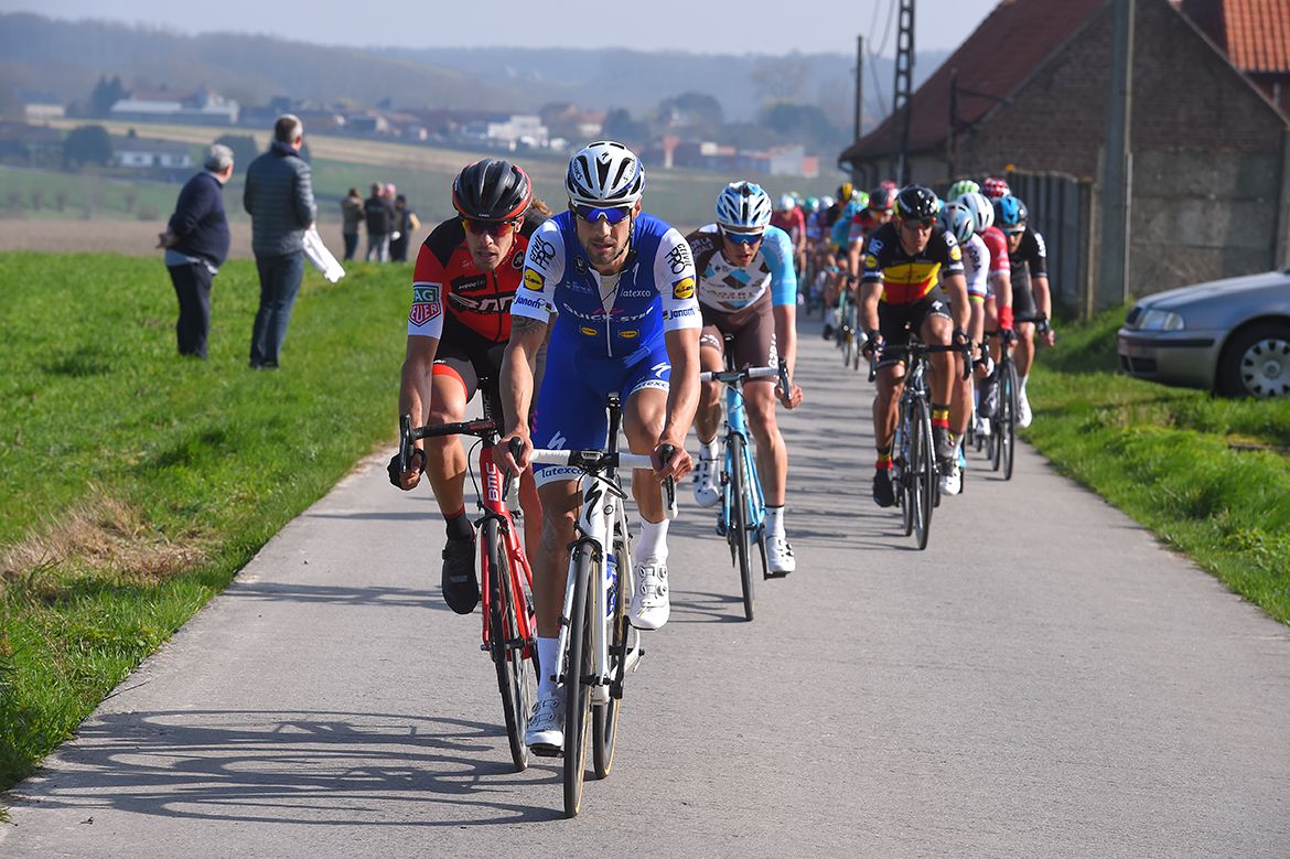 Tom Boonen (Quick-Step Floors) marked by Daniel Oss (BMC)