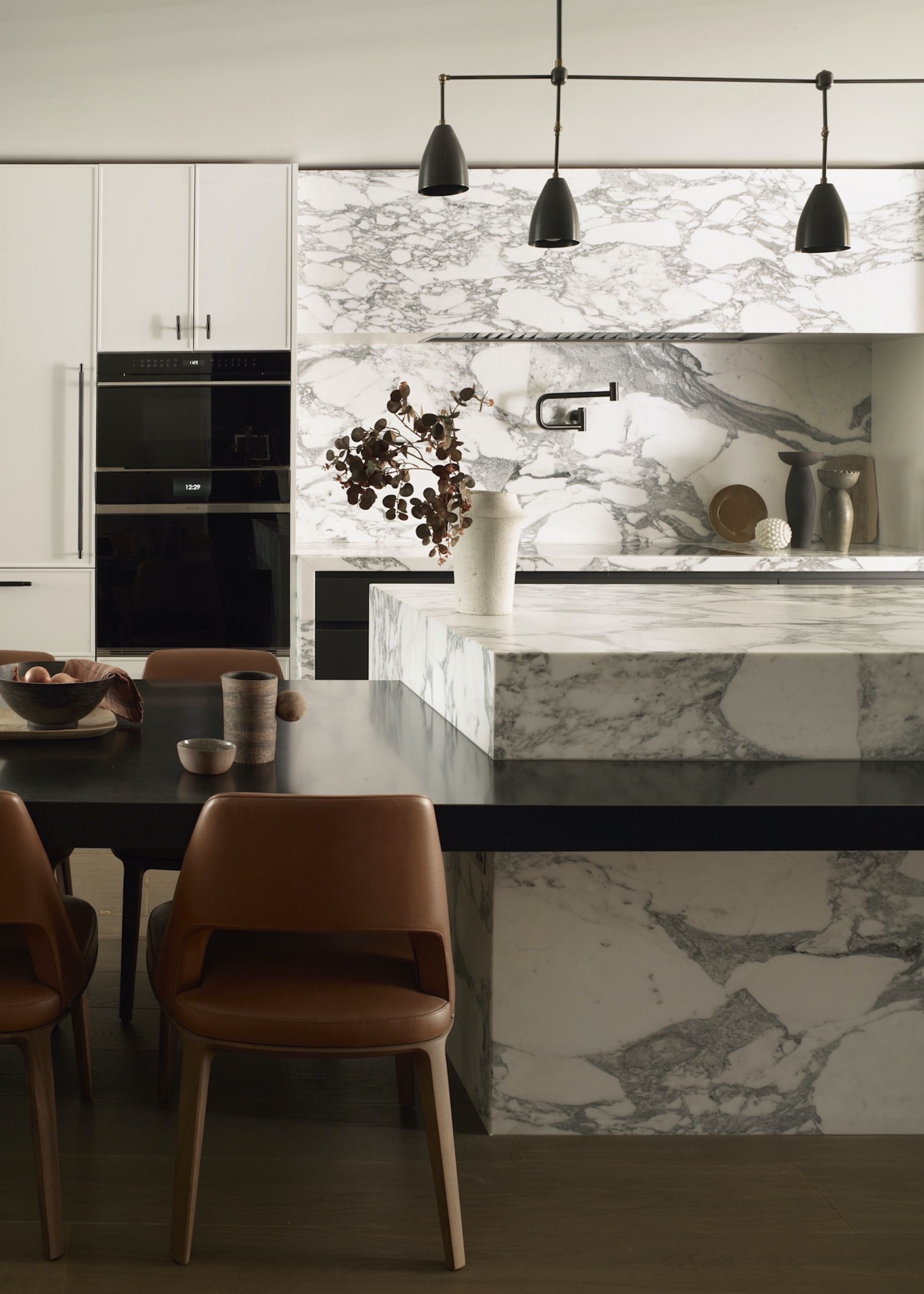 kitchen with marble island and splashback