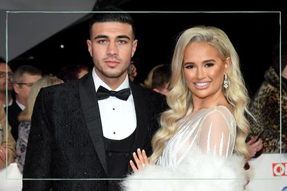 Tommy Fury (left) and Molly-Mae Hague (right) posing for a photo at the NTAs