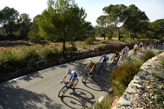 VALENCIA SPAIN FEBRUARY 09 James Knox of The United Kingdom and Team Deceuninck QuickStep Paul Martens of Germany and Team JumboVisma Tim Declerq of Belgium and Team Deceuninck QuickStep Maarten Wynants of Belgium and Team JumboVisma Peloton Landscape during the 71st Volta a la Comunitat Valenciana 2020 Stage 5 a 977km stage from Paterna Valencia VueltaCV VCV2020 on February 09 2020 in Valencia Spain Photo by David RamosGetty Images