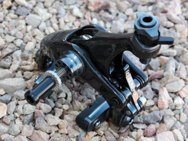 Aluminum, titanium and carbon fiber construction yield a feathery 115g claimed weight per wheel - with pads.