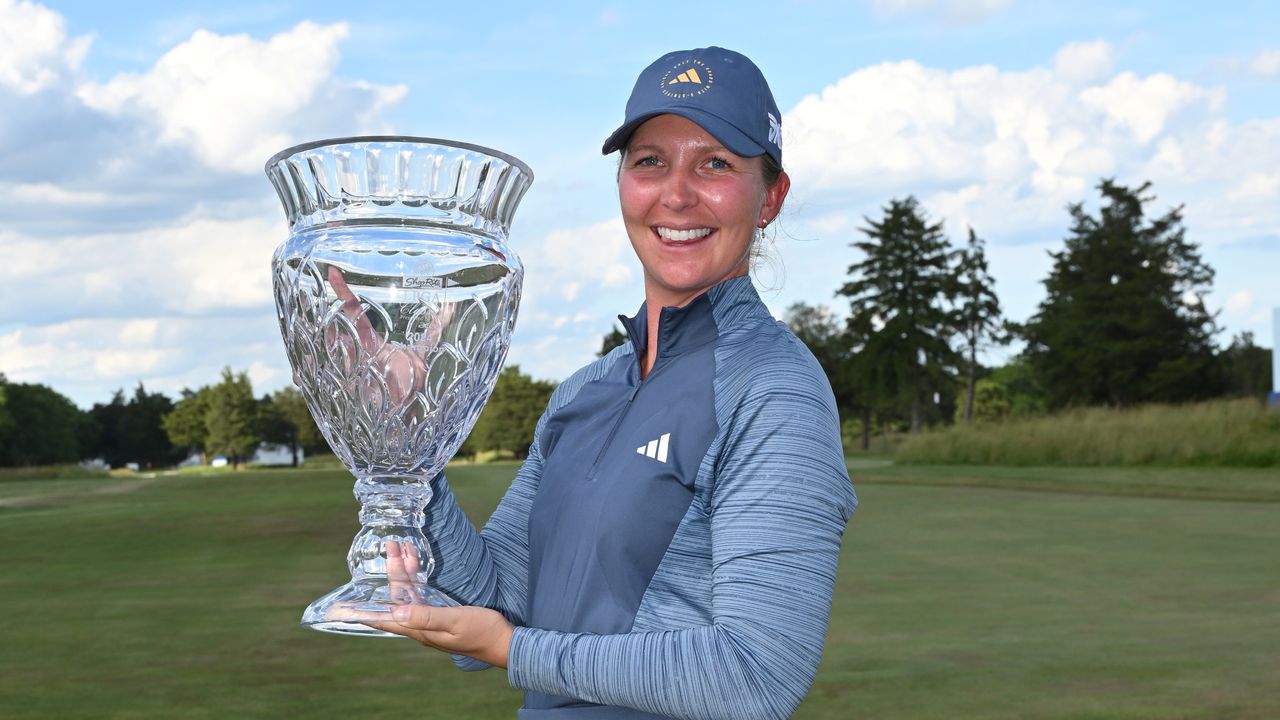 Linnea Strom with the ShopRite LPGA Classic trophy