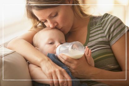 mother bottle feeding her baby