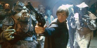 Luke Skywalker with blaster in Return of the jedi
