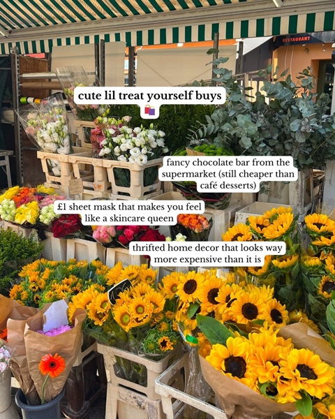 Flowers at a market stall with information on buying yourself things. 
