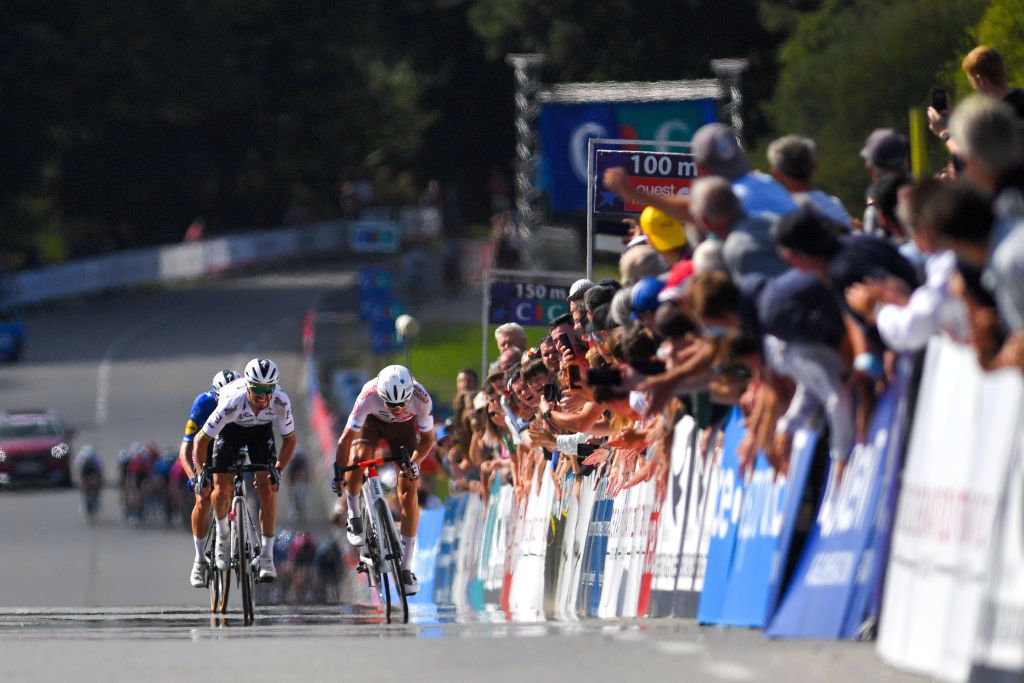 PLOUAY FRANCE AUGUST 29 LR Mikkel Honor of Denmark and Team Deceuninck QuickStep Julian Alaphilippe of France and Team Deceuninck QuickStep and Benoit Cosnefroy of France and Ag2R Citroen Team celebrates winning during the 85th Bretagne Classic OuestFrance 2021 a 251km race from Plouay to Plouay OuestFrance on August 29 2021 in Plouay France Photo by Luc ClaessenGetty Images
