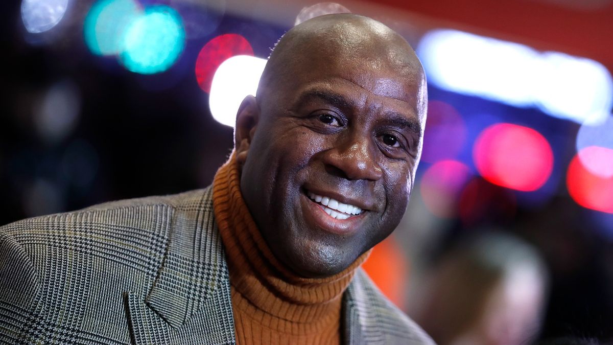 How has Magic Johnson survived with HIV?