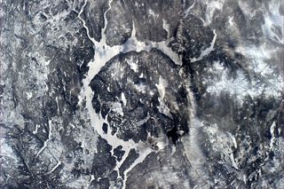 Lake Manicouagan and René-Levasseur Island in Quebec, Canada stand out in this Jan. 16, 2011 photo from astronaut Paolo Nespoli on the International Space Station. It was formed by a meteorite impact over 200 million years ago.