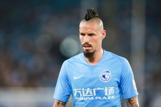 Marek Hamsik in action for Dalian Professional vs Shandong Luneng in July 2019.