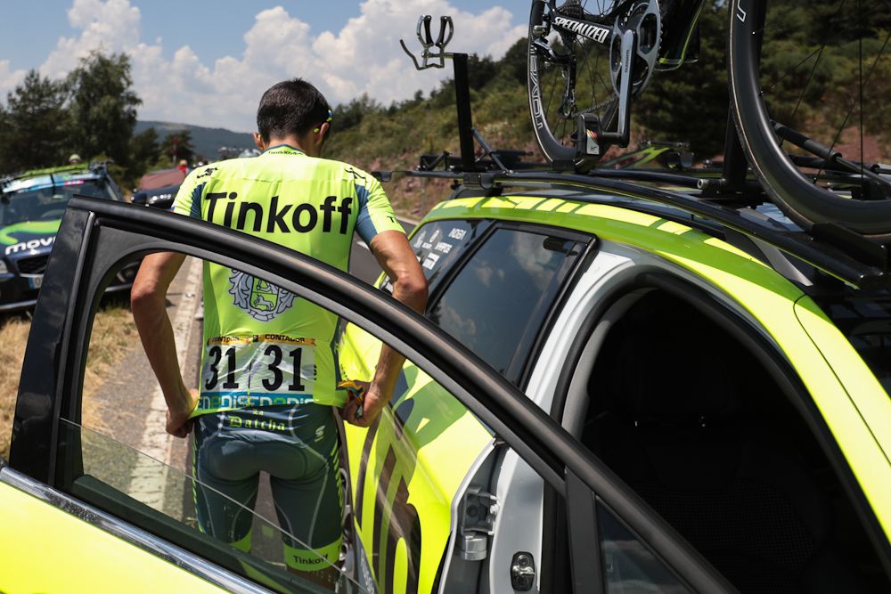Alberto Contador climbs into the team car during stage 9, abandoning the 2016 Tour de France