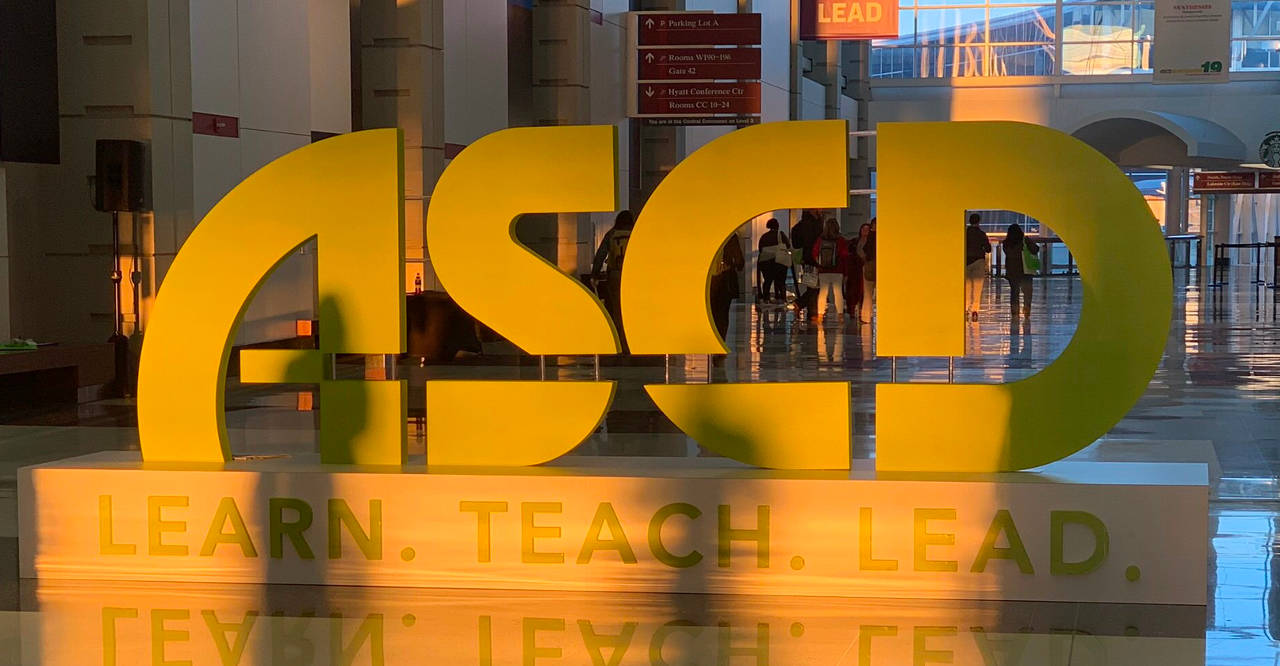Photo of ASCD sign illuminated by sunlight