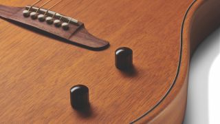 Close up of the knobs on a Fender Highway Dreadnaught electro acoustic guitar