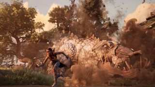 South of Midnight screenshot showing Hazel in combat with Two-Toed Tom, a gigantic albino alligator with a powerful hunger