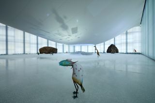 Bird figure in foreground, part of Laure Prouvost exhibition at National Museum Oslo