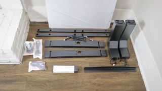 Uppeal 2 Leg Desk unboxed with all of the parts laid out on the floor