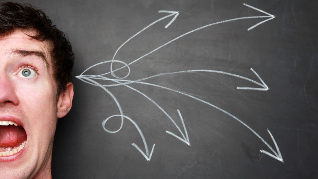 A man yells as illustrated arrows come out of his ear.