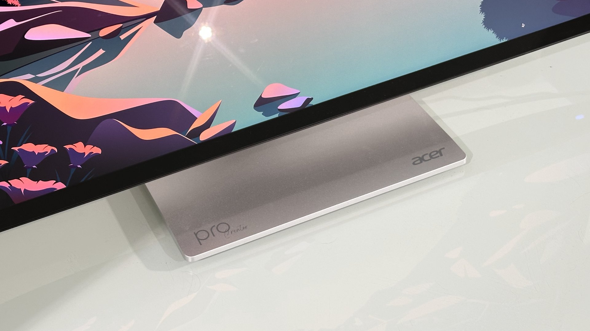 The Acer ProCreator PE320QXT on a desk in a home office during our testing process