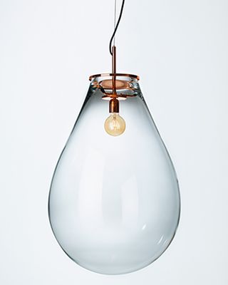Huge glass container surrounding light bulb