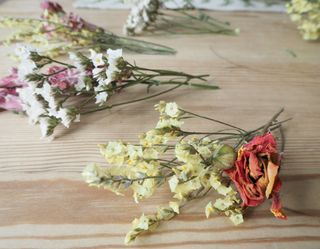 small bunches of dried flowers on a table