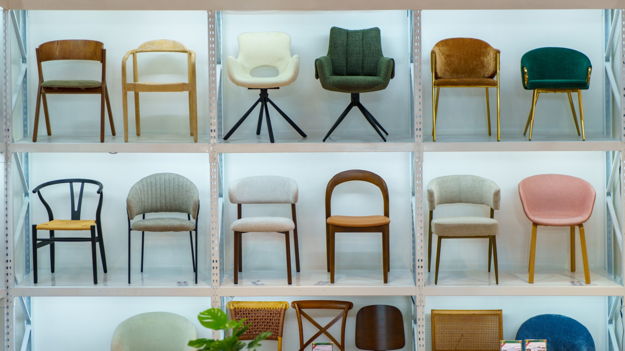 A stock photo of chairs for sale in a furniture showroom.
