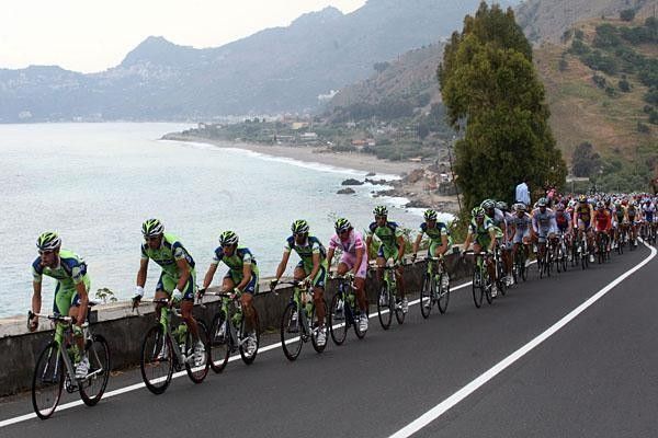 Liquigas in control as the race streams past the seaside view.