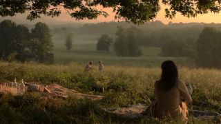 Jennifer Lawrence watches Josh Hutcherson and their "Hunger Games Kids" in the final scene of Mockingjay Part 2.