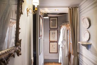 A dressing room with antique artwork at Residenza Napoleone III
