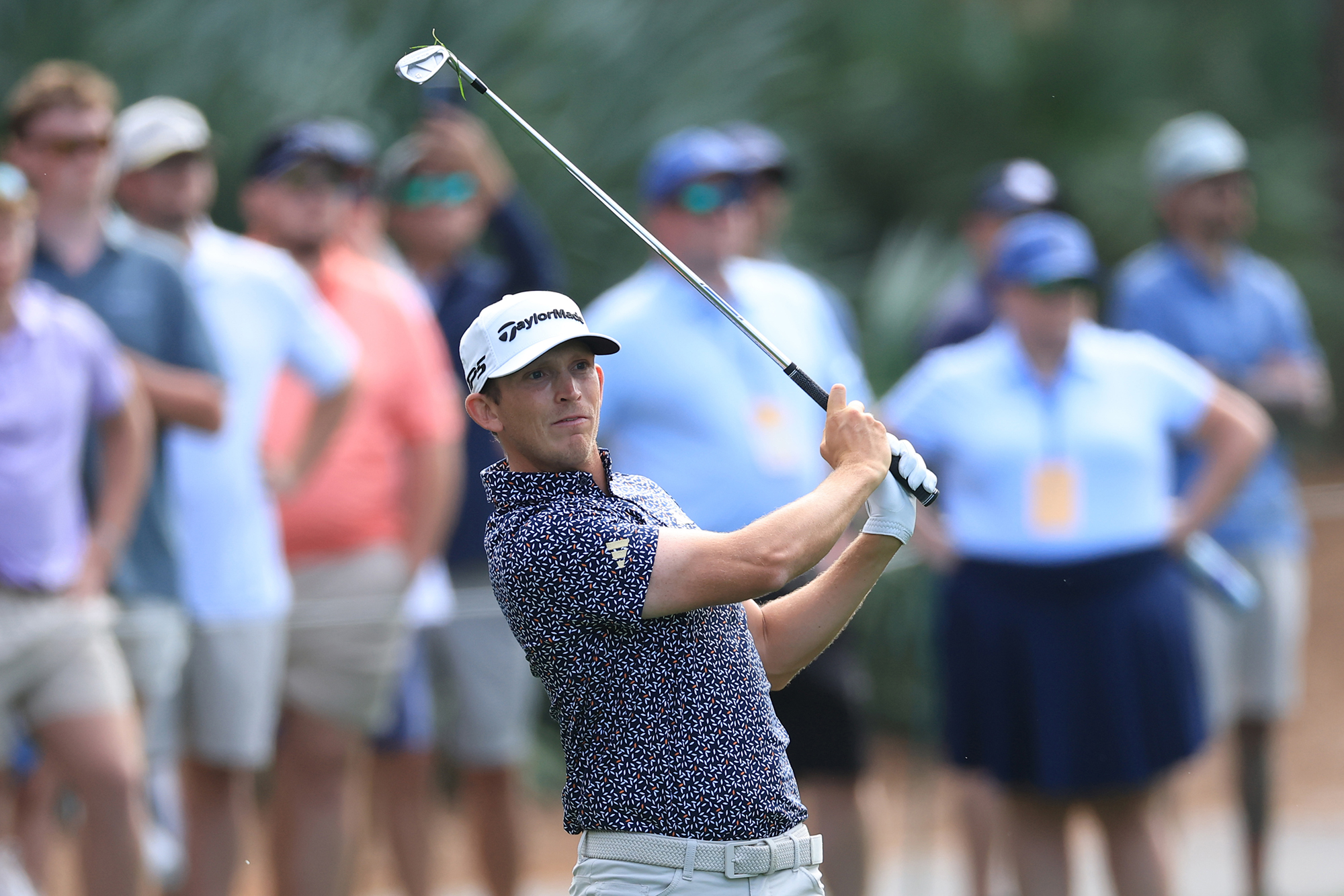 Jacob Bridgeman in the finish position with an iron