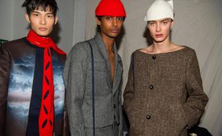 3 male models wearing hats, coats & scarves