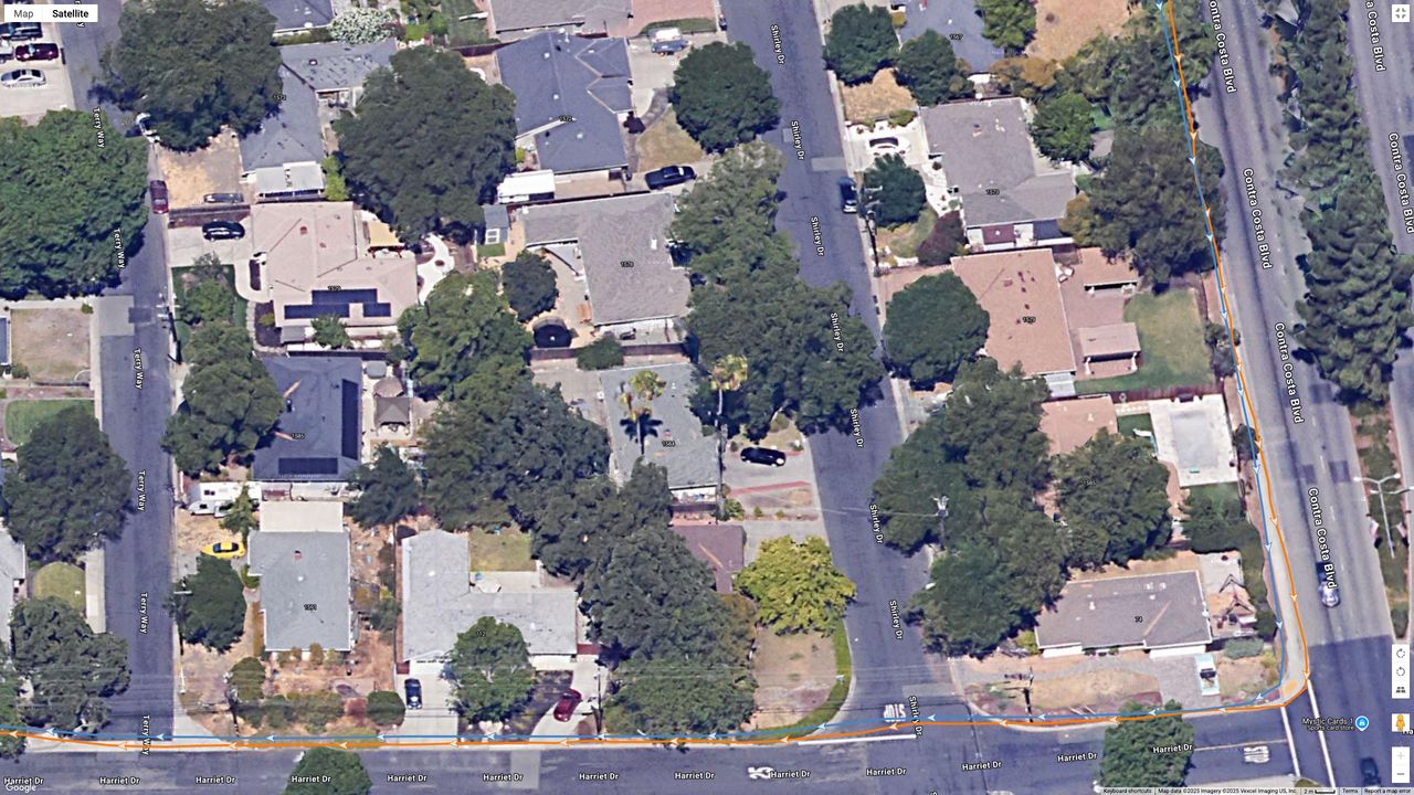 A Google Maps top-down view showing GPS lines for the Garmin Forerunner 970 (orange) and COROS PACE Pro (blue) indicating a running path.