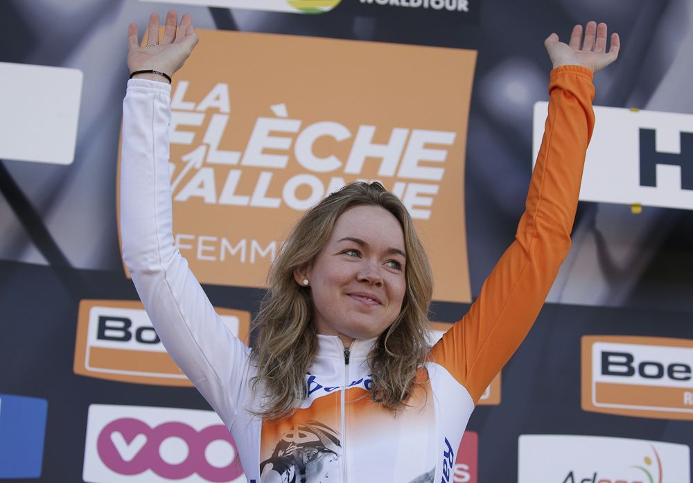 Anna Van Der Breggen celebrates on the podium after winning the 19th La Fleche Wallonne women's cycling race