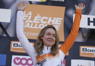 Anna Van Der Breggen celebrates on the podium after winning the 19th La Fleche Wallonne women's cycling race