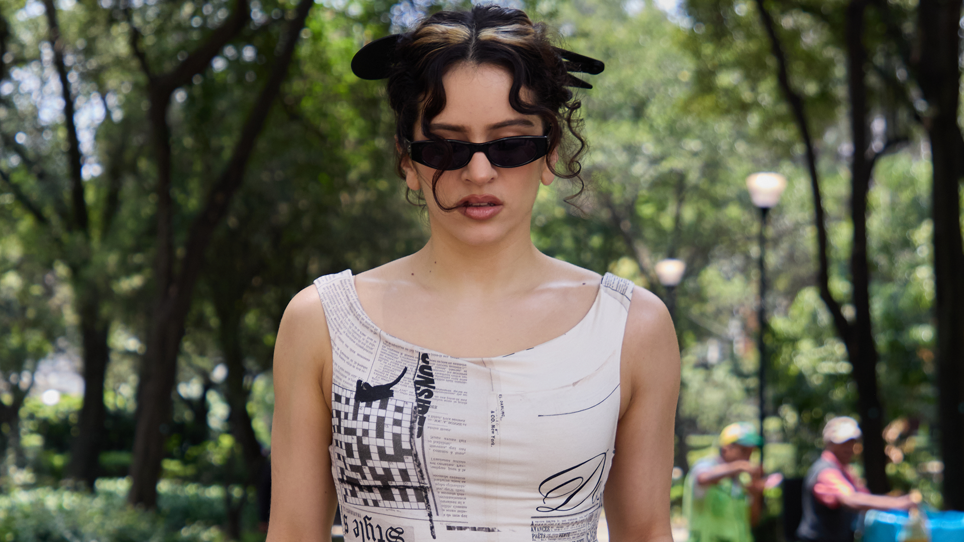 Rosal&iacute;a styled a newspaper dress from Desigual with heeled ballet flats 